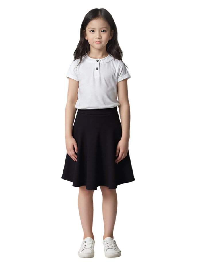 Young girl wearing a white polo shirt and black skirt on a white background